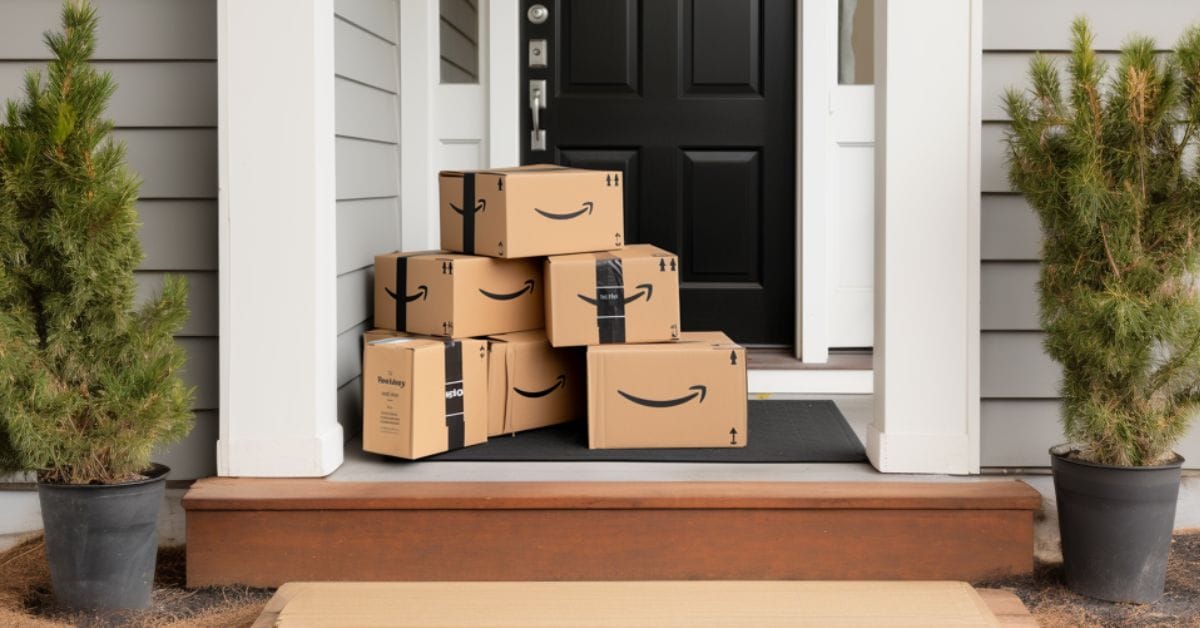 a stack of cardboard boxes on a porch